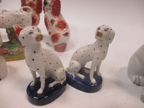 Lot 12 - Four small size pairs of Staffordshire dogs...