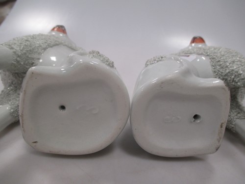 Lot 12 - Four small size pairs of Staffordshire dogs...