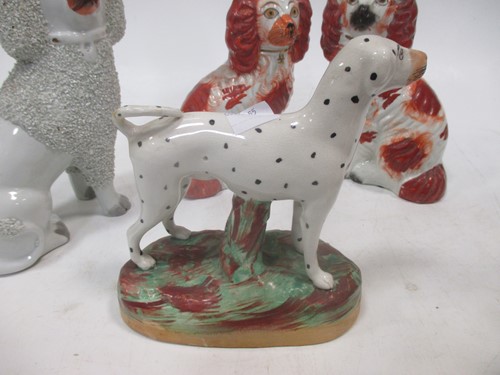 Lot 12 - Four small size pairs of Staffordshire dogs...