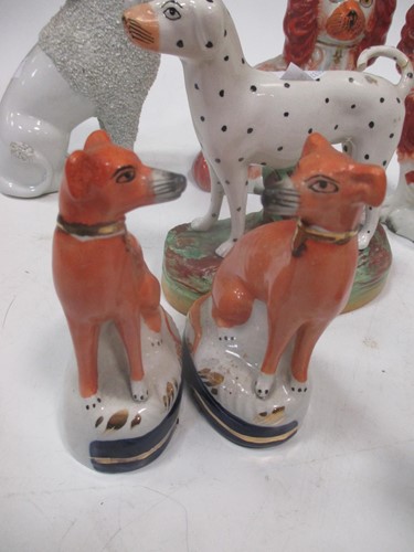 Lot 12 - Four small size pairs of Staffordshire dogs...