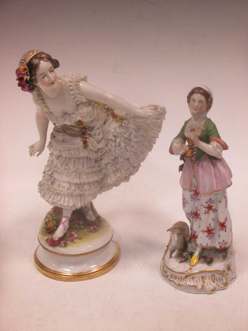 Lot 13 - A Continental porcelain figure of a dancer...