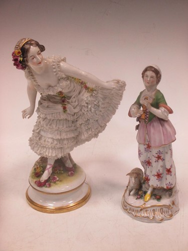 Lot 13 - A Continental porcelain figure of a dancer...