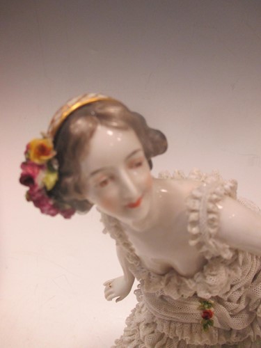 Lot 13 - A Continental porcelain figure of a dancer...