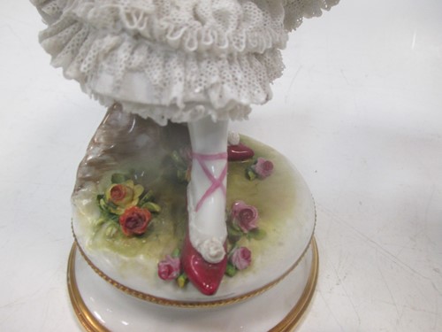 Lot 13 - A Continental porcelain figure of a dancer...