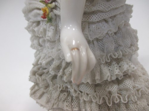 Lot 13 - A Continental porcelain figure of a dancer...