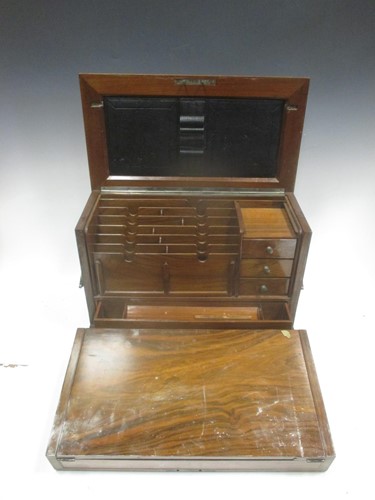 Lot 168 - A Victorian walnut desk desk compendium