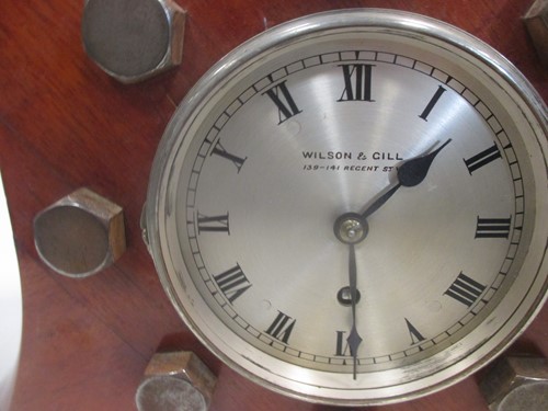Lot 31 - An early 20th century propellor boss clock by...