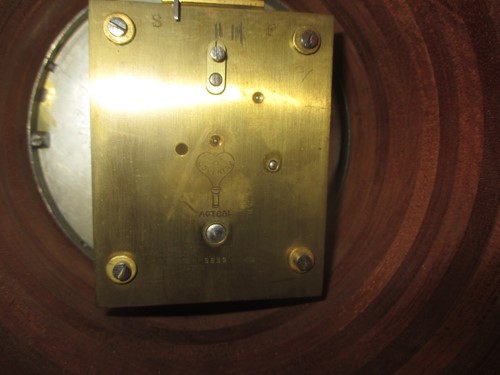 Lot 31 - An early 20th century propellor boss clock by...