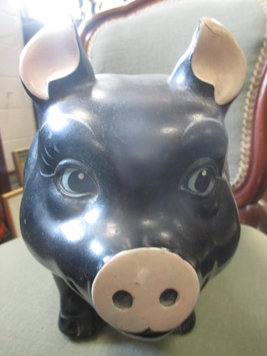 Lot 27 - An Alexander Backer Co. painted black pig...