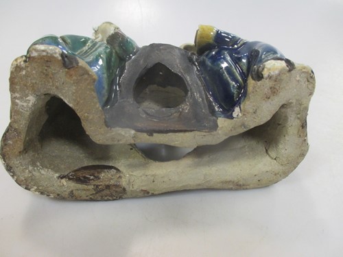Lot 34 - Two Chinese pottery enamelled figures
