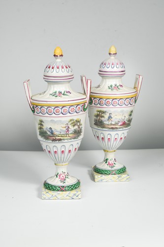 Lot 108 - A pair of continental faience two-handled...