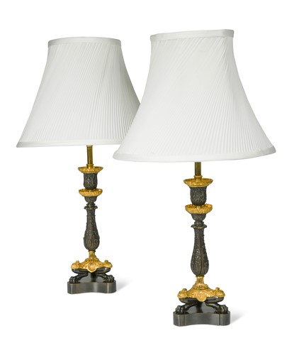 Lot 330 - A pair of Regency bronze and ormolu triform candlestick lamps, circa 1830