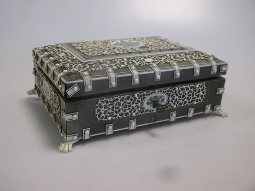 Lot 21 - A late 19th or early 20th century Indian ivory...