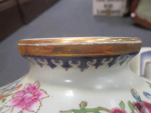 Lot 9 - A pair of Samson porcelain armorial vases,...