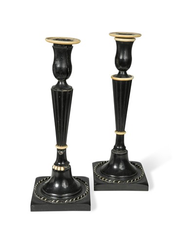 Lot 350 - A pair of Anglo-Indian ebony and ivory candlesticks, late 19th century