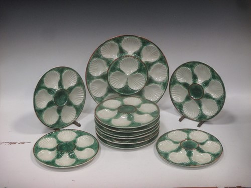 Lot 3 - A set of twelve scallop plates, (two broken)...