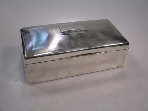 Lot 181 - A silver table cigarette box, 21 x 10cm, cedar...