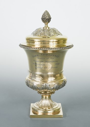 Lot 444 - A George V silver gilt horse racing trophy cup and cover