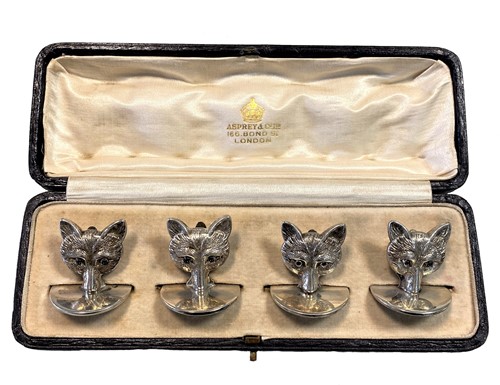 Lot 316 - Four George V silver novelty menu holders, mark of Sampson Mordan & Co, retailed by Asprey
