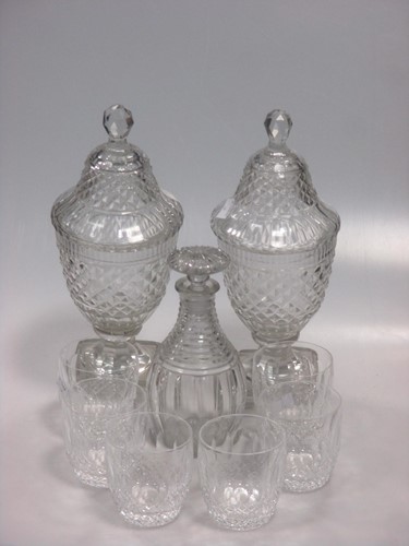 Lot 9 - A pair of glass sweetmeat jars and covers,...