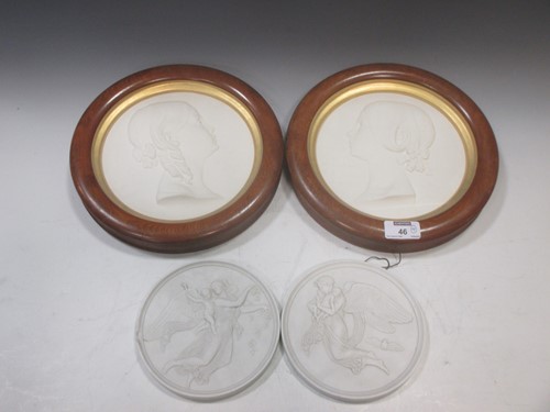 Lot 46 - Two framed plaster portrait roundels together...