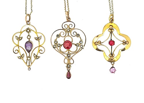 Lot 47 - A trio of  Edwardian gemset pendants