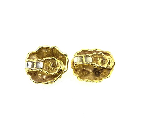 Lot 19 - A pair of star sapphire ear clips