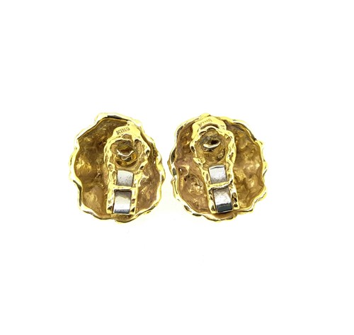 Lot 19 - A pair of star sapphire ear clips
