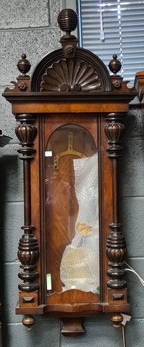 Lot 568 - A 19th century walnut case Vienna wall clock,...