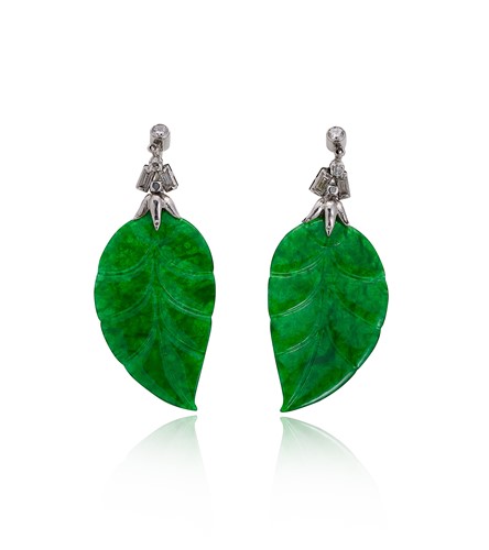 Lot 157 - A pair of carved jade and diamond ear pendants