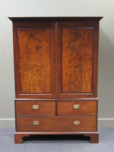 Lot 548 - A 19th century mahogany linen press 183 x 129...