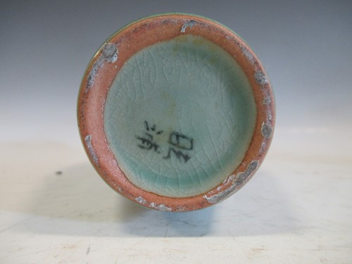 Lot 20 - A Chinese celadon glazed meiping vase carved...