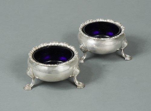 Lot 363 - A pair of George II silver cauldron salts
