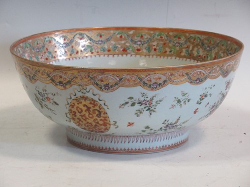 Lot 4 - A large Sampson punch bowl, decorated in 18th...