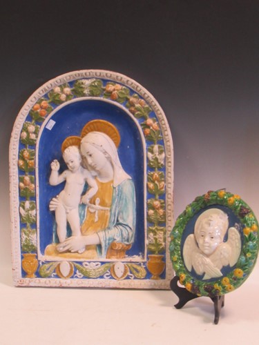 Lot 97 - A plaque of the Madonna and child after Della Robbia Workshops, c1900-20