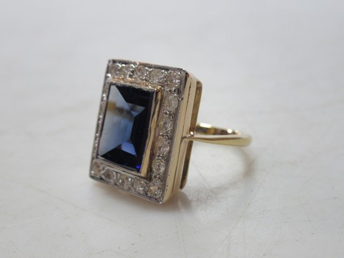 Lot 176 - A synthetic sapphire and diamond ring,...