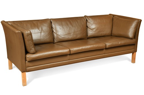 Lot 305 - A modern brown leather three-seat sofa