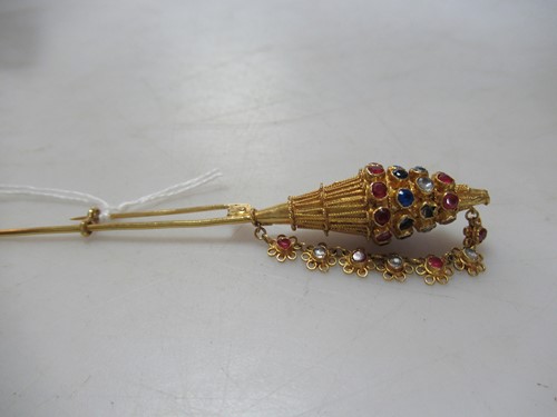 Lot 171 - An Asian pin set with paste, tested to at...