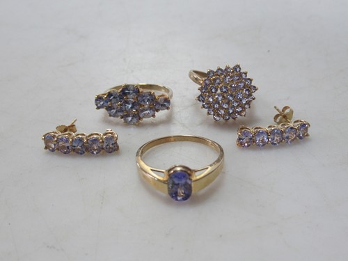 Lot 179 - A 9ct tanzanite cluster ring and a pair of 9ct...