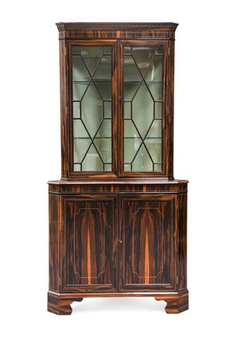 Lot 914 - A calamander corner cabinet, 20th century