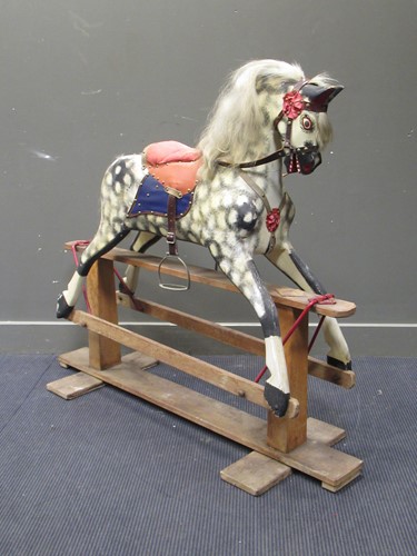 Lot 121 - An early 20th century dapple grey rocking...