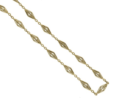 Lot 63 - A decorative French metalwares gold guard chain