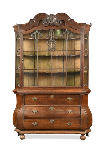 Lot 882 - A Dutch oak bombe cabinet, late 18th /early 19th century