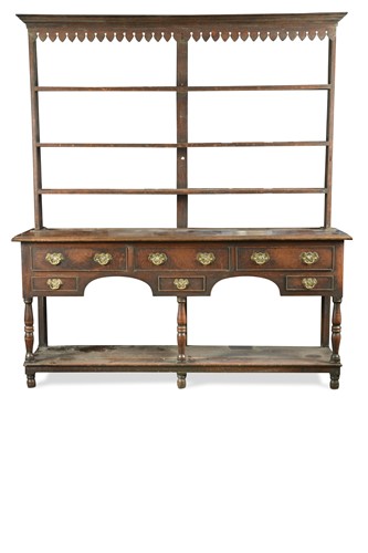 Lot 751 - A late George II oak dresser