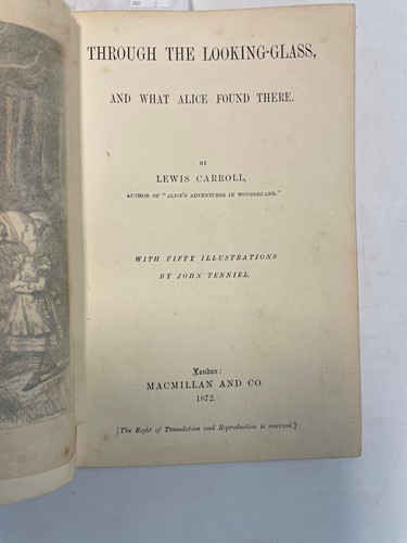 Lot 324 - LEWIS (C S) [DODGSON (Charles L)] Through the...