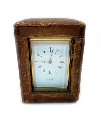 Lot 943 - A late Victorian polished brass cased carriage clock