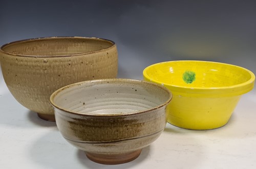 Lot 666 - A large studio pottery olive glazed bowl,...