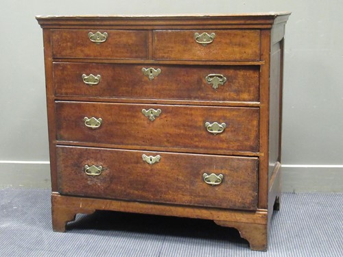Lot 575 - A George III countrymade oak chest of drawers...