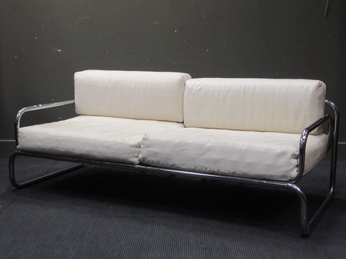 Lot 632 - Chrome tubular sofa with white striped...