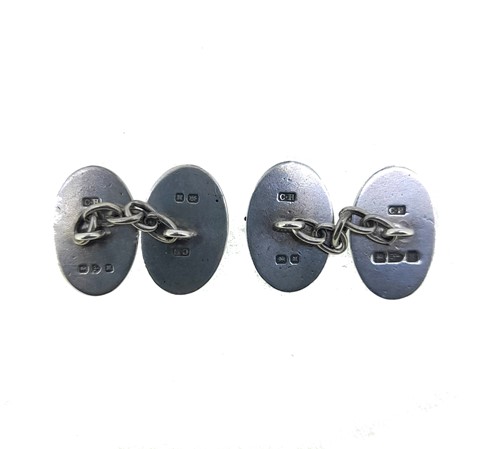 Lot 12 - Two pairs of cufflinks and a gun dog pin